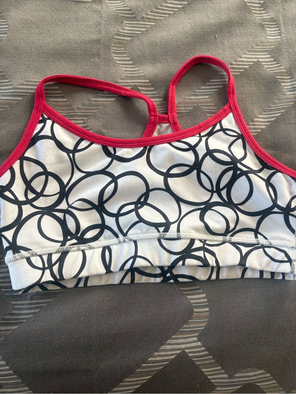 Black & White Circle Print Sports Bra with Red Trim